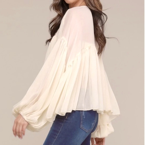 A. Peach boho sheer top. - Picture 2 of 9